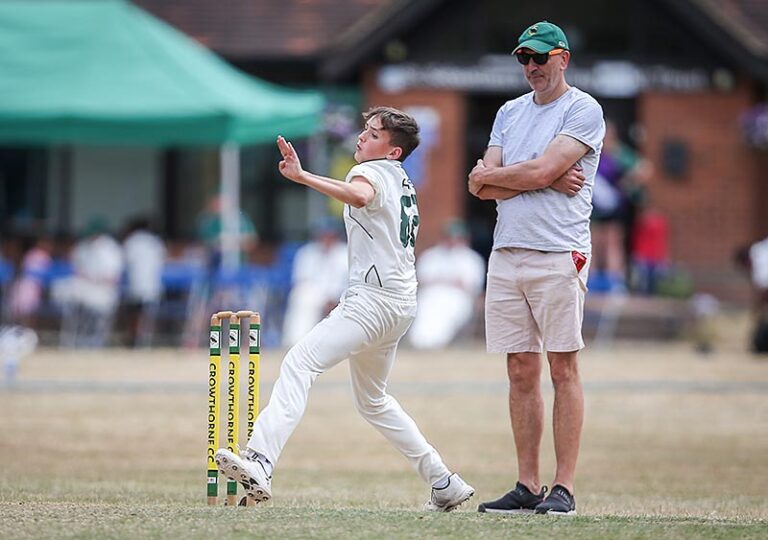 Cricket boy bowling